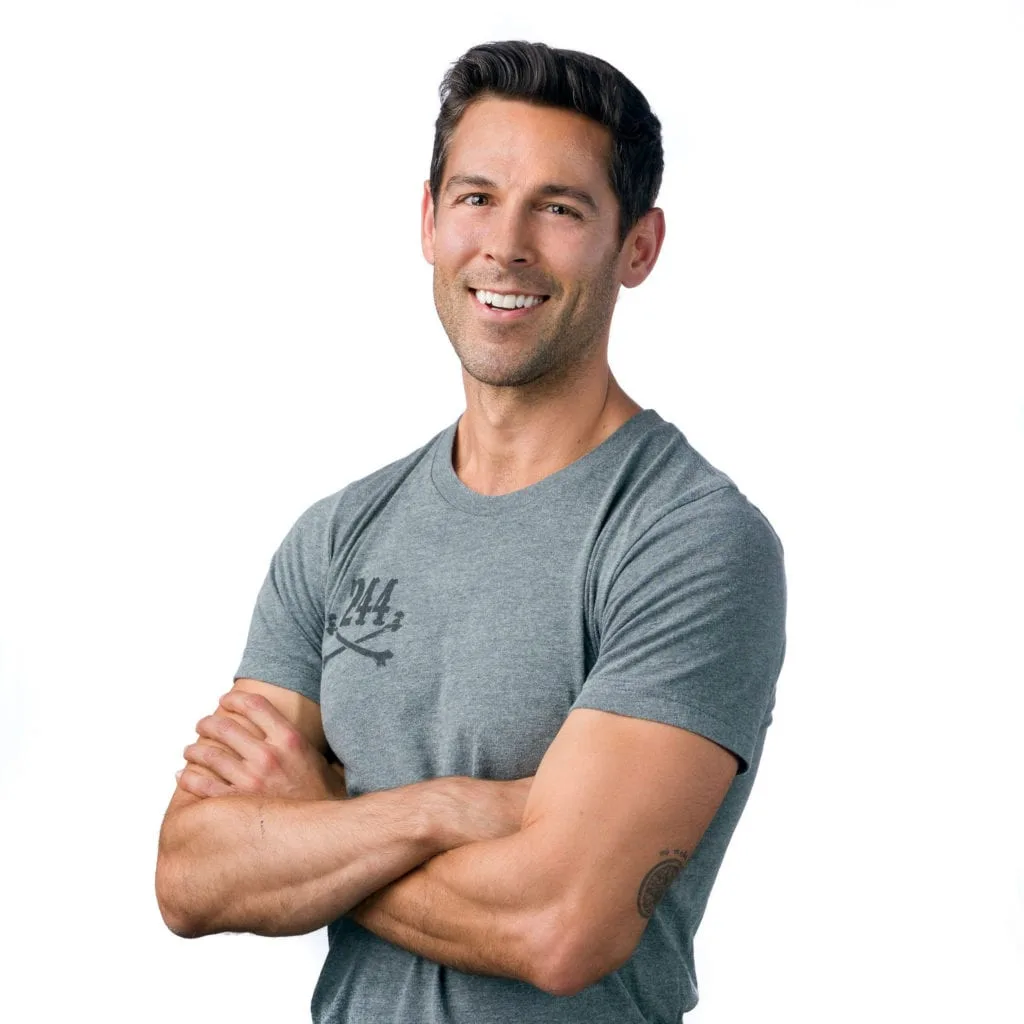 trainer standing in front of a white background